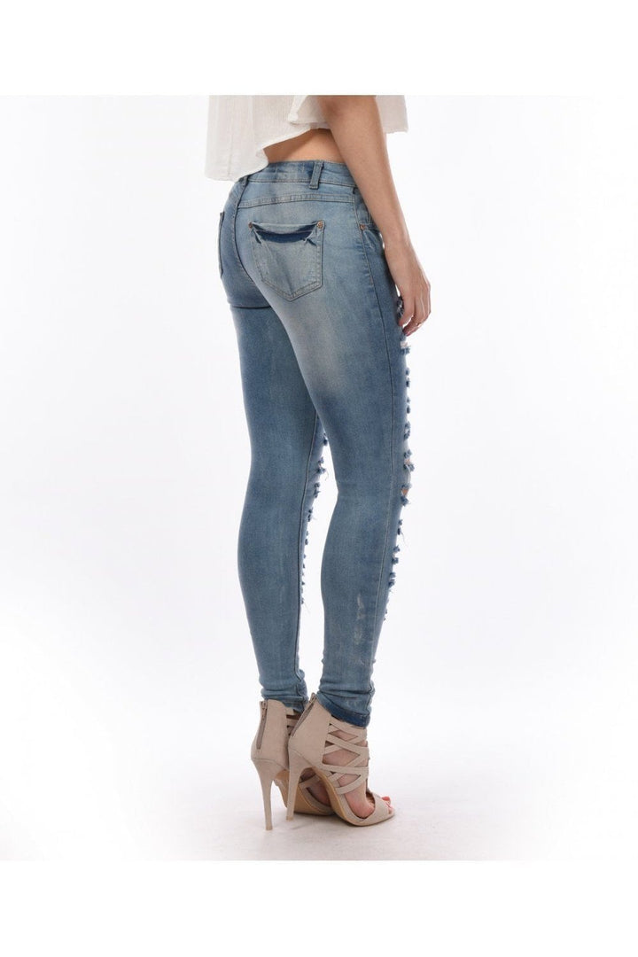 Faded Light Blue Ripped Skinny Jeans Side Back View