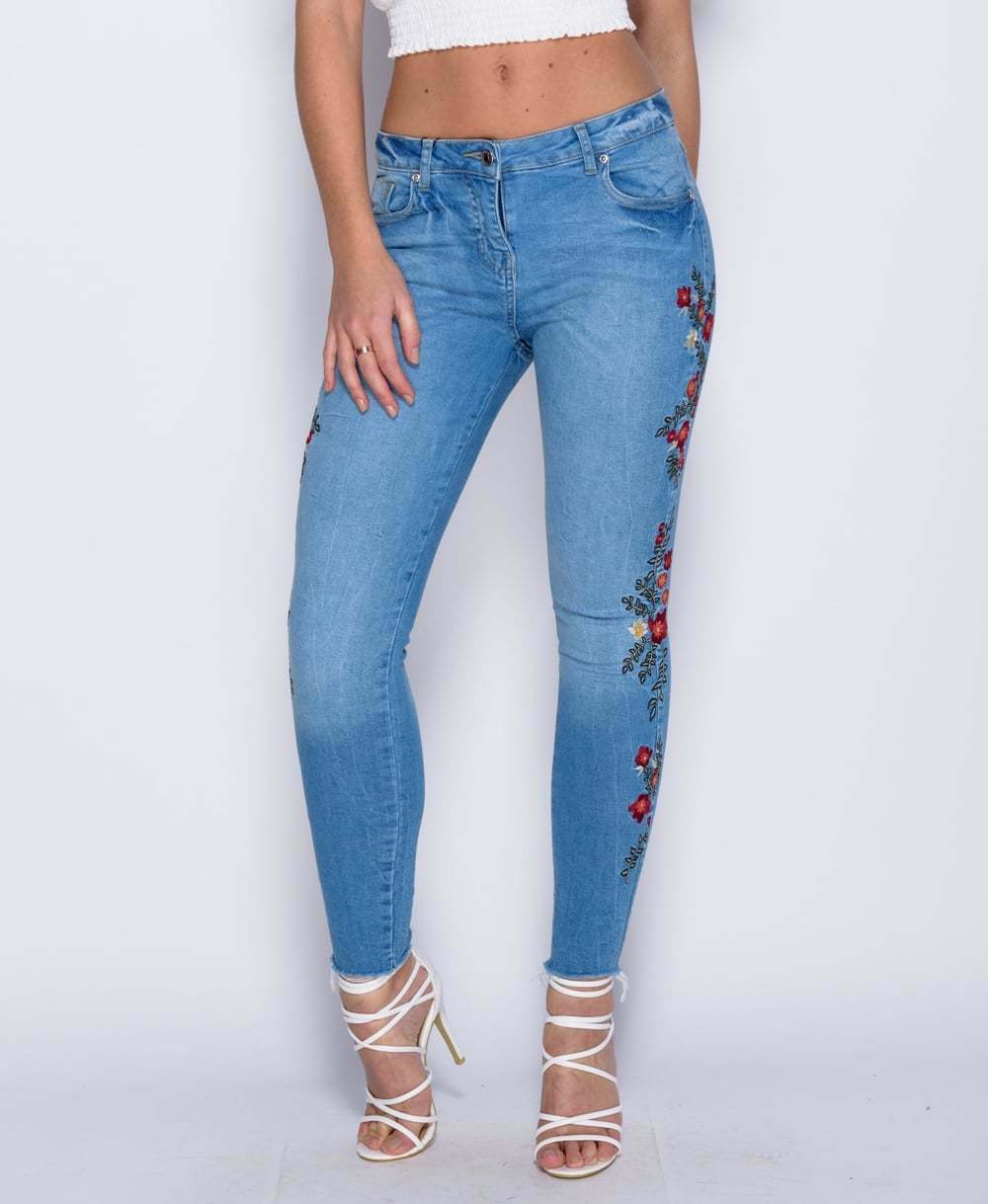 Blue Frayed Hem Jeans with Floral Embroidery Close Up View