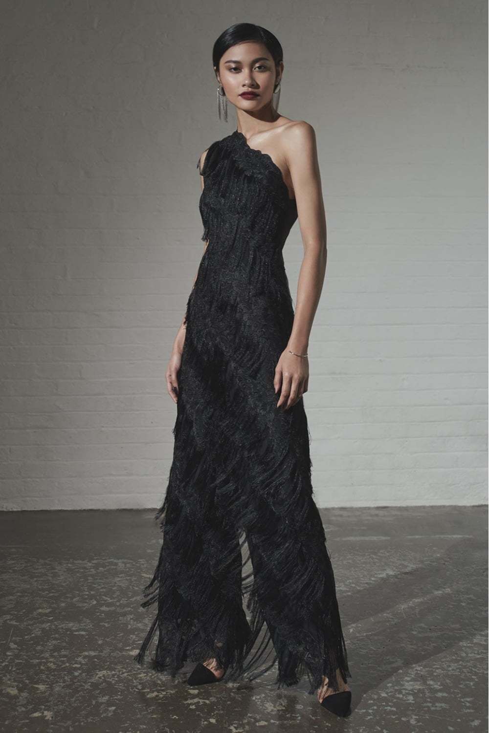 The Black Fringed Lace Jumpsuit - Front Glamour View